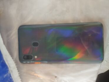 Digər mobil telefonlar: Məhsul: Smartfon Xüsusiyyətlər: - Ön hissə: tam ekran dizaynı, yuxarı