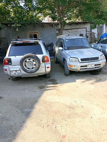 hunda 1997: Toyota RAV4: 2 l | 1997 il — 1