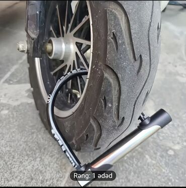 ucuz netbook kampanya: Qara və gümüşü rənglərdə olan moped kilidi. Bu kilid mopediniz