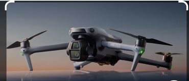 дрони: Новый квадрокоптер DJI Air 3S в сером корпусе. Оснащен камерой для