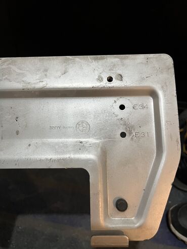 Другие детали кузова: Подномерник бмв е34 оригинал Japan