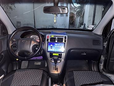 e39 rul: Hyundai Tucson: 2 л | 2009 г. Кроссовер — 6