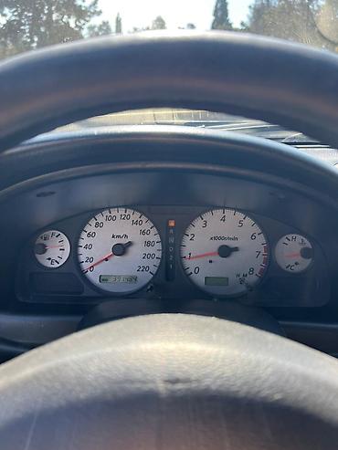 mini canta: Nissan Sunny: 1.6 l | 2006 il Sedan — 7
