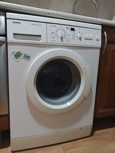 Paltaryuyan maşınlar: Siemens Siwamat XL 106 önyükləməli paltaryuyan maşın - Ön yükləmə