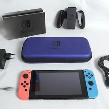 Nintendo Switch: U ponudi je Nintendo Switch. Stanje: lepo očuvana, manji tragovi — 15