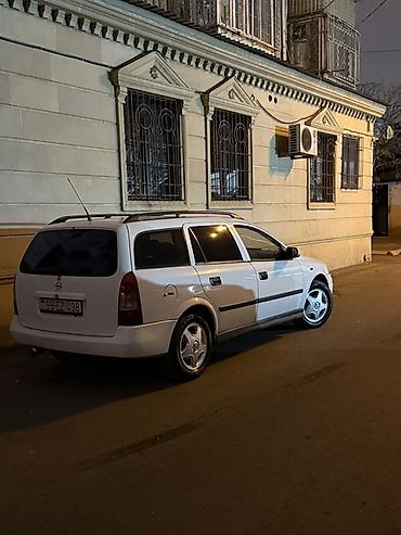 opel astra maşın: Opel Astra Caravan (ağ), universal kuzov - Geniş yük və sərnişin — 8