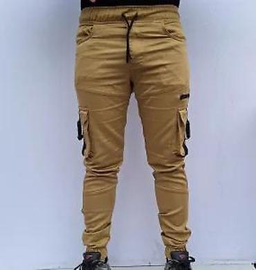 Ostala muška odeća: Muške cargo pantalone – bež/karamel boja - Kroj: slim/skinny nogavice — 3