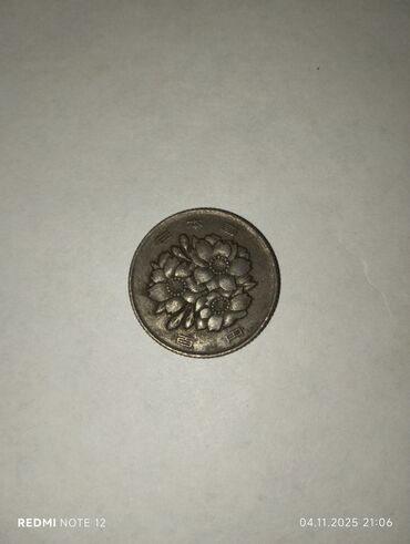 как можно продать старые монеты: Монета Японии 100 йен, год чеканки: Сёва 59 (1984). - Номинал: 100