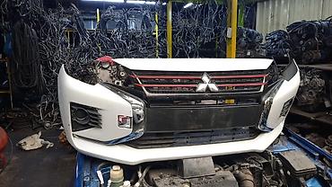 e60 bufer: Ön, Mitsubishi Pajero Sport/Montero Sport/L200 Triton — 1