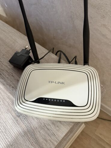 ночные камеры видеонаблюдения: Роутер TP-Link с двумя антеннами Характеристики и возможности: - Две