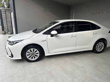 тойота аква гибрид: Toyota Corolla: 2021 г., 1.8 л, Гибрид, Седан — 5