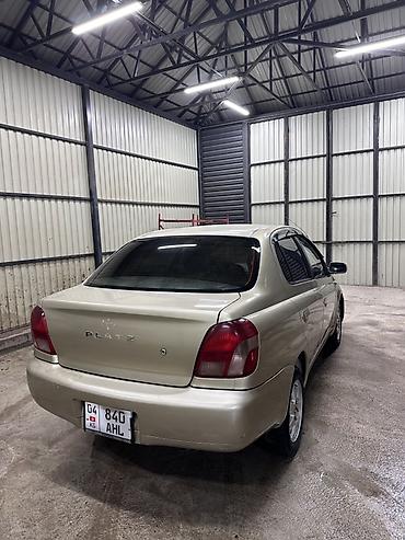 kia 1 5: Toyota Platz: 2000 г., 1.3 л, Автомат, Бензин, Седан — 6