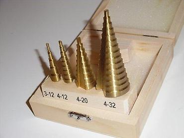 Burgije: Set stepenastih burgija u drvenoj kutiji - 4 komada titanisano — 2