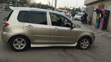 через банк машина: Mazda Demio: 2003 г., 1.3 л, Автомат, Бензин, Хетчбек