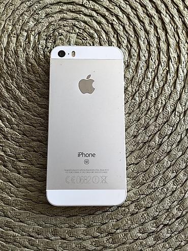o bag: Iphone SE 2016 beli sa 64 gb memorije, otključan za sve mreže. Telefon — 7