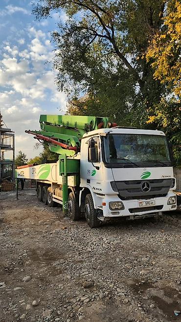 Автоуслуги: Два автобетононасоса (52м и 76м). Автобетононасос, стрела 52 м — 2