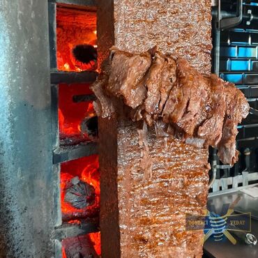 Sifarişlə hazır yeməklər: Məhsul: Odun közündə bişən ət dönər Xüsusiyyətlər: - Şaquli şişdə — 2