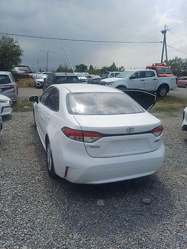 желмаян аккумулятор: Toyota Corolla: 2022 г., 1.8 л, Автомат, Гибрид, Седан — 4