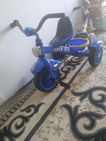 Балдар үчүн велосипеддер: Детский трехколесный велосипед Super Trike, с педалями на переднем — 1