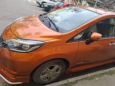 генератор фольксваген: Nissan Note e-POWER, narıncı rəngli, şəhər üçün ideal hibrid (benzin — 5