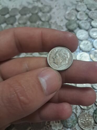 Sikkələr: Məhsul: ABŞ sikkələri (centlər) Tərkib: - 1 sent sikkələri - 5 sent — 12