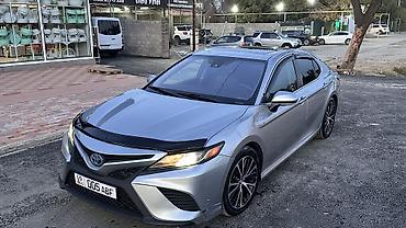 100: Toyota Camry: 2018 г., 2.5 л, Вариатор, Гибрид, Седан — 2
