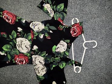 ara torbe: Ženska midi haljina s floralnim printom - Model: kroj u obliku slova — 5