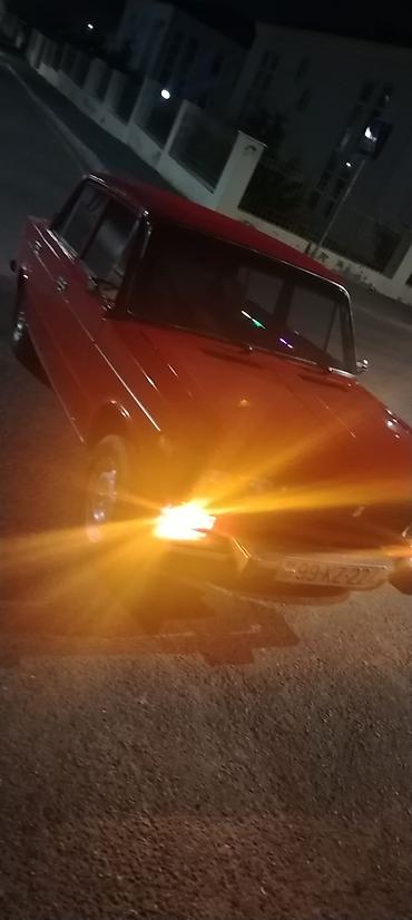 avtomobil az zil 130: VAZ 2106 sedan – klassik qırmızı rəng, xrom xarici detallarla. - — 3