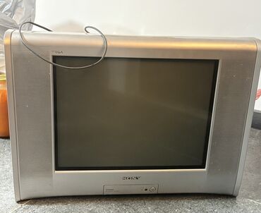плоский телевизор цена: Телевизор Sony Trinitron WEGA с плоским экраном, выполненный в