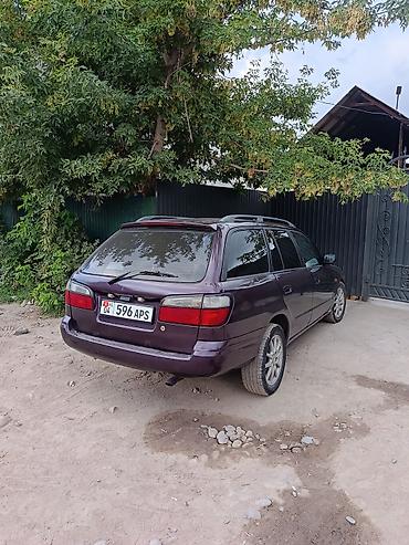 Mazda: Mazda 323: 2000 г., Универсал — 7