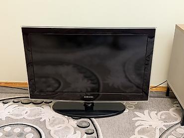 jack e4: Телевизор Samsung, диагональ около 26–32". ЖК‑экран с широкими — 1