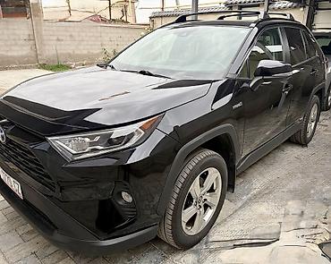 битые машины купить: Toyota RAV4: 2021 г., 2.5 л, Автомат, Гибрид, Кроссовер — 1