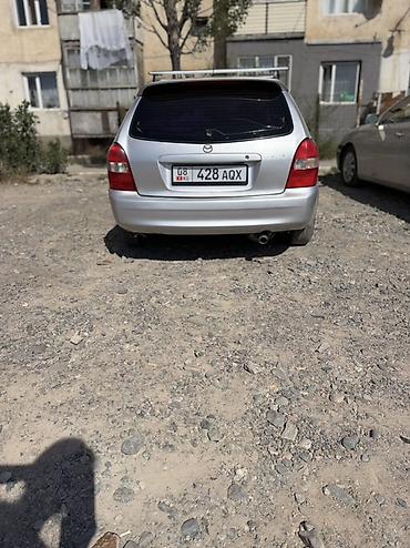 портер 133: Mazda Familia: 2001 г., 1.6 л, Механика, Бензин, Хэтчбэк — 4