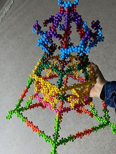 Модульные покрытия, пазлы: Конструктор «Снежинки» из разноцветных пластиковых деталей в одном — 11