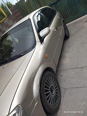 e53 amg: Mazda Familia: 2002 г., 1.6 л, Универсал — 6