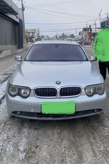 продаю авто мерс: Автомобиль BMW 7-й серии в серебристом цвете, модель E65/ надо делать