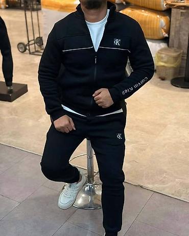 ski pantalone decathlon: Muška komplet trenerka u sportskom Calvin Klein stilu, izrađena od — 2