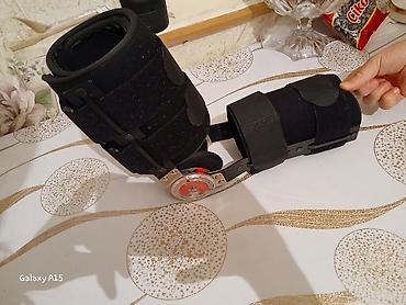 Ортезы: Tənzimlənən diz oynağı üçün ortopedik breys - İki hissəli — 2