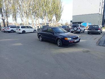 k3 2020: Mazda 323: 2000 г., Автомат, Бензин, Седан — 4