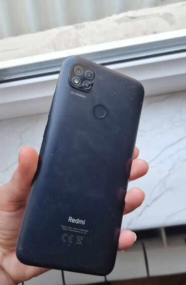 telofon redmi: Redmi markalı bu mobil telefon tünd boz rəngdədir və arxa tərəfində