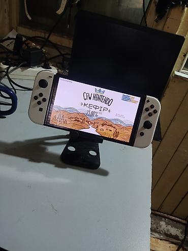 Nintendo Switch OLED: Nintendo Switch oled чипованная (прошитая) встроенная память 32гб+64гб — 2