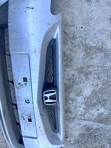 Автозапчасти: Передний бампер Honda с заводской решёткой и эмблемой. Основные — 4