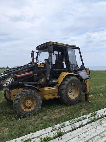 тракторные услуги: Экскаватор, Caterpillar, Колесный — 1
