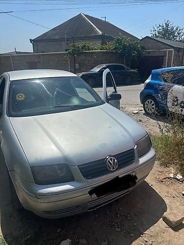 qolf 4 ehtiyyat hissələri: Volkswagen Bora, gümüşü sedan - Volkswagen Bora 2003 – 1.6 🚗 — 2