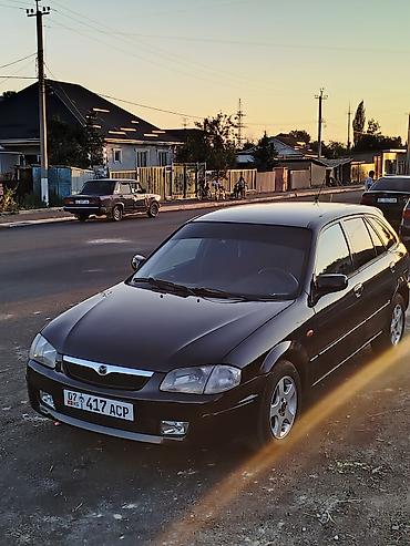 наклейки бмв: Mazda 323: 1999 г., 1.5 л, Механика, Бензин, Универсал — 7