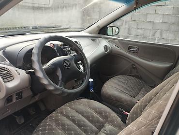 e klass: Nissan Almera Tino: 2001 г., 1.8 л, Механика, Бензин, Хэтчбэк — 5