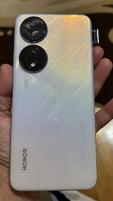 telefon tap: Honor X7b, 128 GB, Barmaq izi — 8