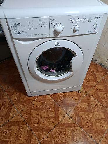 корпус для компьютера: Indesit IWSC 5105 (Eco Time) önyükləməli paltaryuyan maşın - Yükləmə — 1