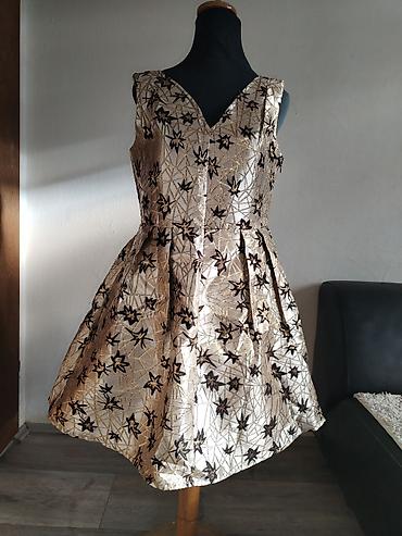 cari: Haljina IVIVI Collection – model 2229 OR, veličina M. - Kroj — 1