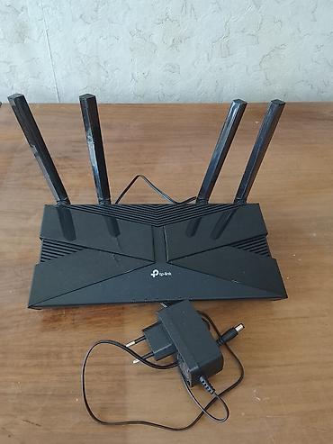 Двухдиапазонный Wi‑Fi роутер TP‑Link с четырьмя внешними антеннами и